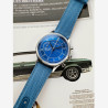 Montre française pour femme. Chronographe bleu avec bracelet en tissu et boucle ardillon.