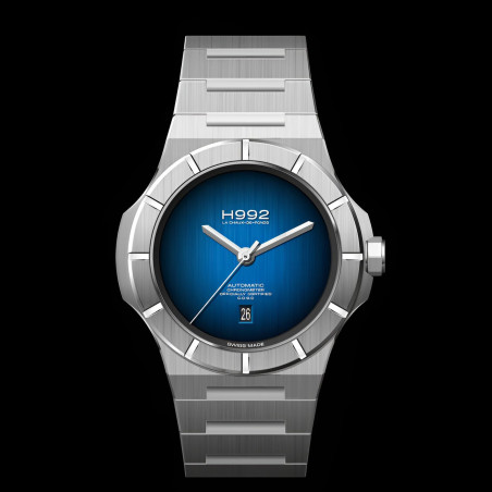 H992 H4.2 montre sport avec bracelet en acier intégré et son cadran épuré d'un bleu profond. sur fond noir