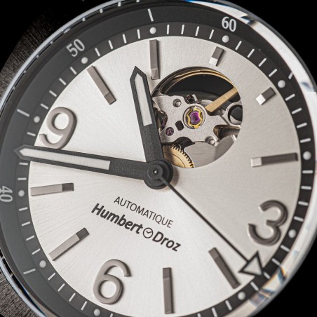 Montre Française Humbert-Droz HD1 Acier cadran coeur ouvert gris argent mouvement automatique.